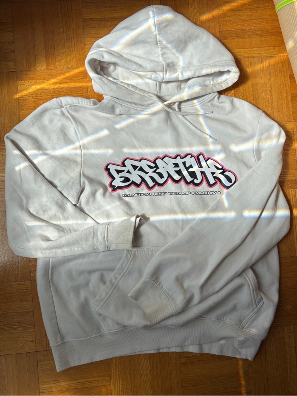 Cream Graphic Hoodie with Front Script Logo - Men - Picture 1 of 5